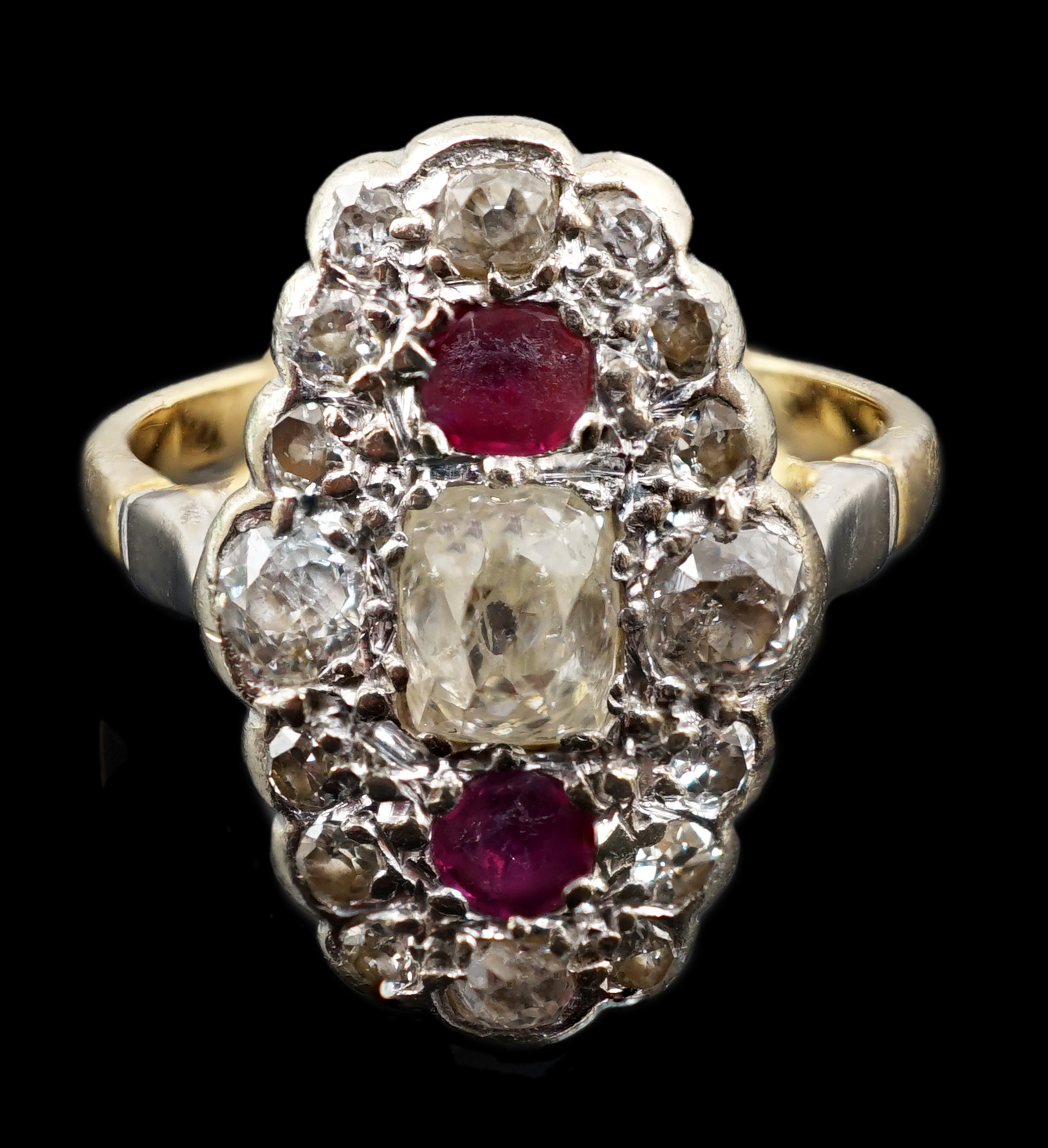 An 18ct gold ruby and diamond cluster ring